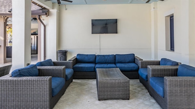 view of patio / terrace featuring ceiling fan and an outdoor hangout area