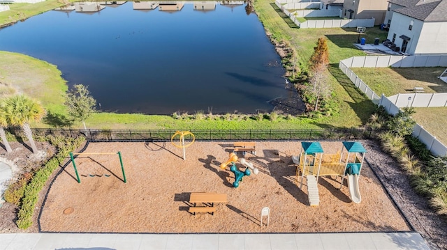 bird's eye view with a water view