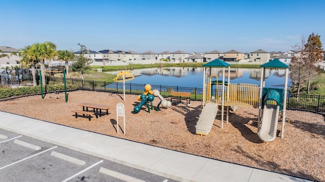 view of play area featuring a water view