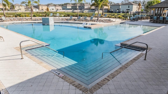 view of pool with a patio area