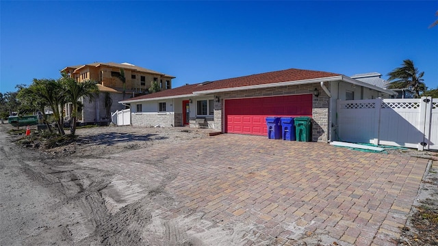 view of front of property with a garage