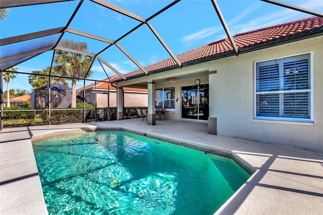 616 Misty Pond Ct, Bradenton, FL 34212 - outdoor pool featuring a patio, a ceiling fan, and glass enclosure