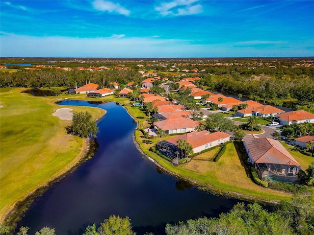 bird's eye view with a water view