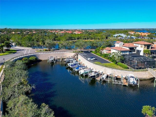 birds eye view of property featuring a water view