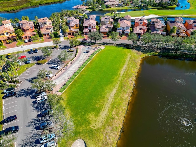 bird's eye view with a water view