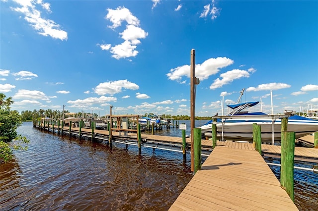 616 Misty Pond Ct, Bradenton, FL 34212 - dock with boat lift and a water view