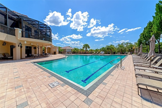 616 Misty Pond Ct, Bradenton, FL 34212 - community pool featuring a patio area