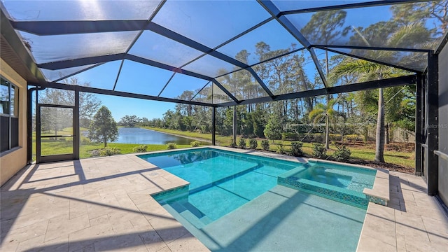 view of pool with glass enclosure, a patio area, and a water view