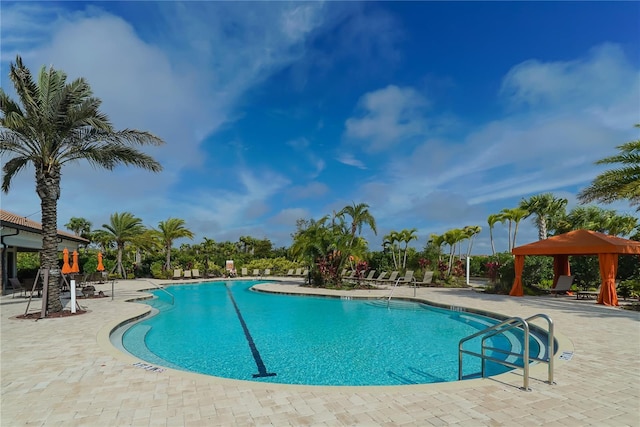 view of pool with a gazebo and a patio