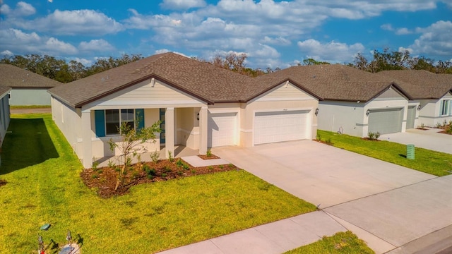 ranch-style home with a front yard and a garage