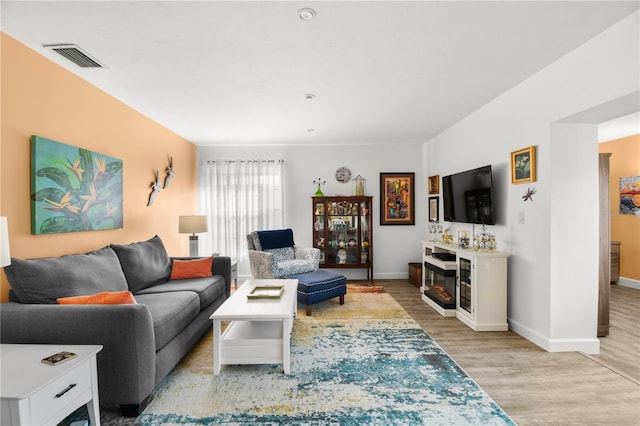 living room with light wood-type flooring