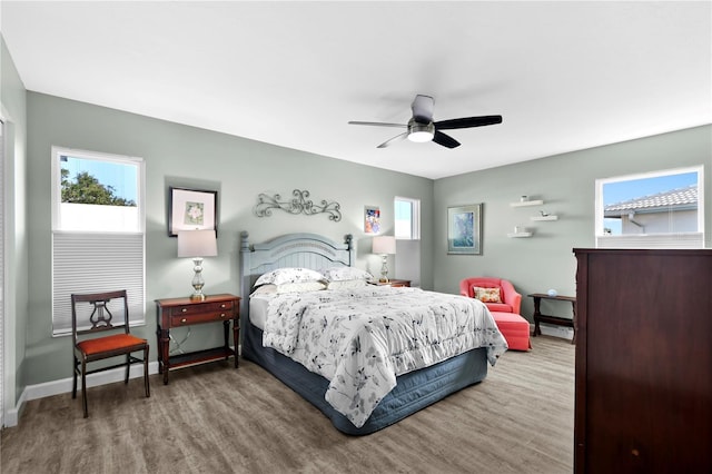 bedroom featuring wood-type flooring and ceiling fan