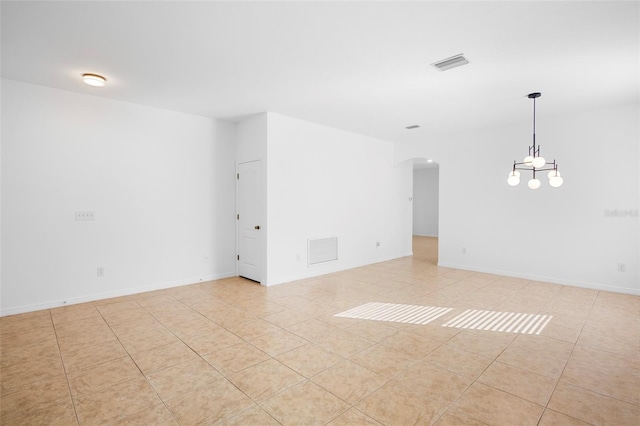 empty room with light tile patterned flooring