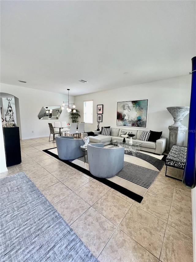 living room with light tile patterned flooring