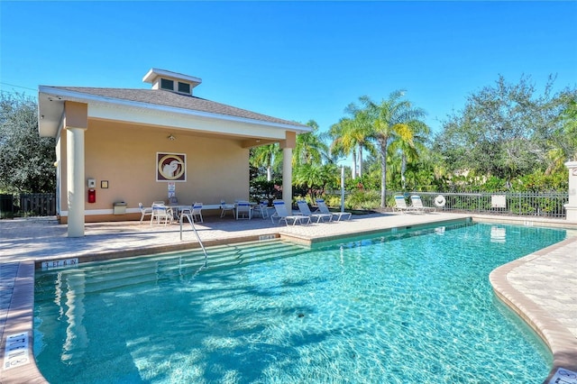 view of pool featuring a patio area