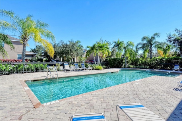 view of pool featuring a patio area