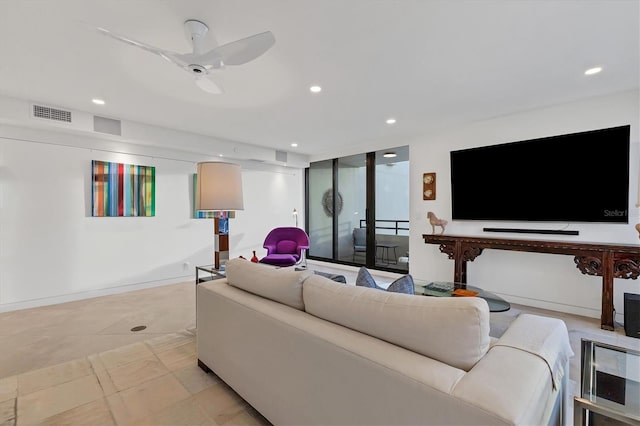 living room with ceiling fan