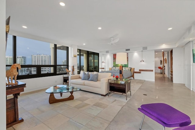 living room featuring ceiling fan