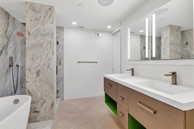 1255 N Gulfstream Ave Unit Ph1501, Sarasota, FL 34236 - bathroom featuring a freestanding tub, double vanity, a marble finish shower, and recessed lighting