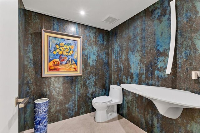 1255 N Gulfstream Ave Unit Ph1501, Sarasota, FL 34236 - bathroom with toilet, a soaking tub, and tile patterned flooring