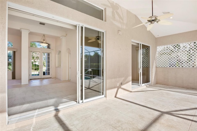 view of patio featuring french doors and ceiling fan