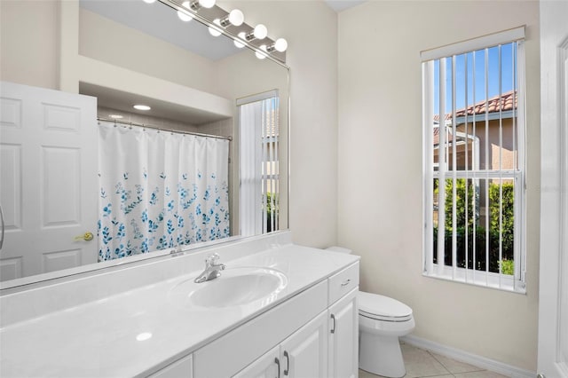 bathroom with tile patterned flooring, vanity, toilet, and a shower with curtain