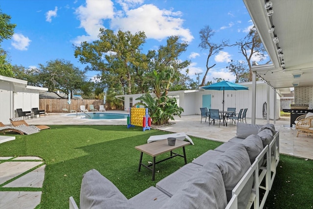 view of yard with a fenced in pool, an outdoor hangout area, and a patio area