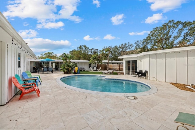 view of pool with a patio