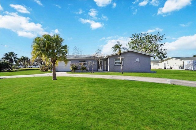 ranch-style house with a front yard and a garage