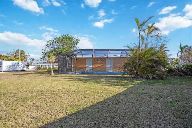 view of yard with a lanai