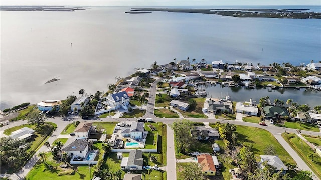 bird's eye view with a water view