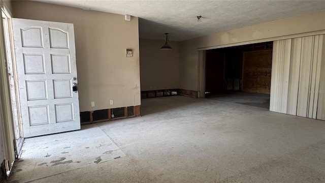 806 Arlington Rd, Palmetto, FL 34221 - unfurnished room with a textured ceiling and a pendent fire sprinkler