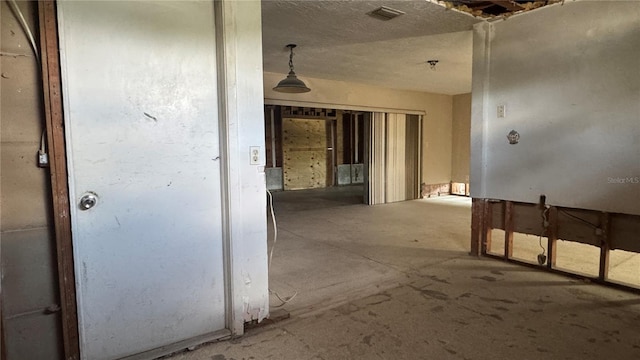 806 Arlington Rd, Palmetto, FL 34221 - corridor with concrete floors