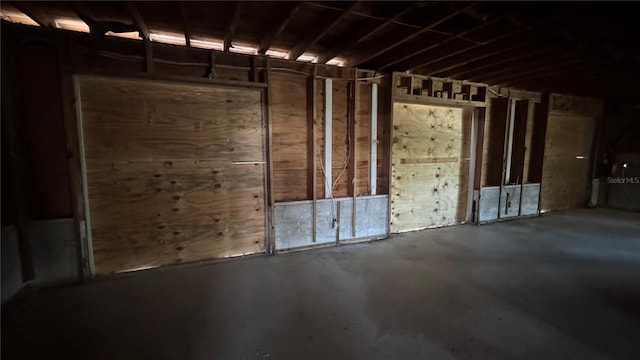 806 Arlington Rd, Palmetto, FL 34221 - miscellaneous room with unfinished concrete floors