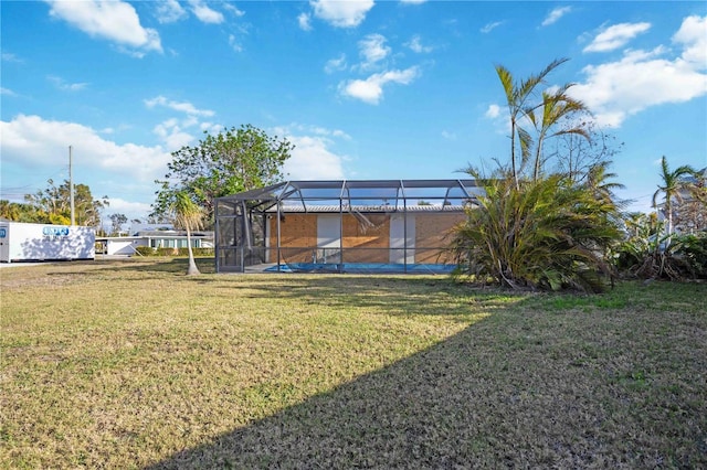 806 Arlington Rd, Palmetto, FL 34221 - view of grassy yard featuring a lanai
