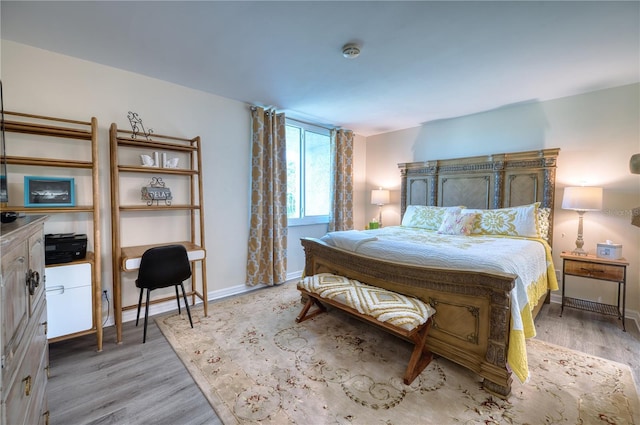 bedroom featuring light wood-type flooring