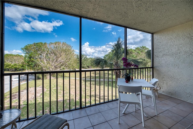 unfurnished sunroom with a wealth of natural light