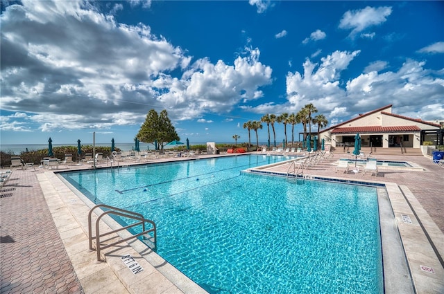 view of swimming pool featuring a patio