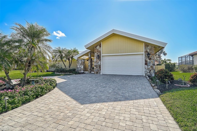 view of front of property with a garage