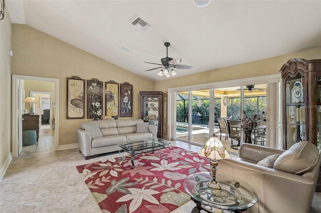 living room with light tile patterned floors, vaulted ceiling, and ceiling fan