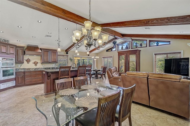 dining room with vaulted ceiling with beams and a notable chandelier