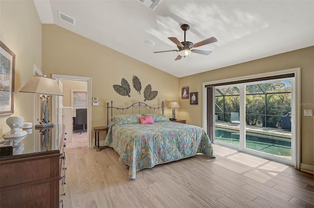 bedroom with ceiling fan, light wood-type flooring, lofted ceiling, and access to outside