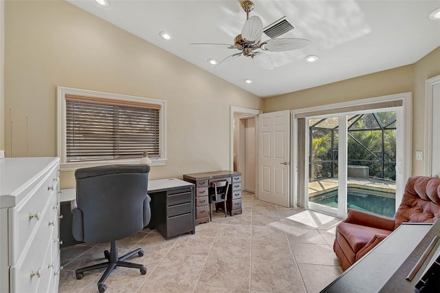 tiled office featuring ceiling fan and vaulted ceiling