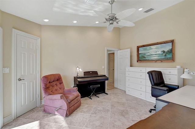 office with ceiling fan and light tile patterned floors