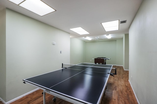 playroom with wood-type flooring