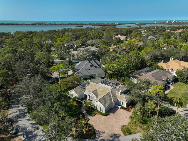 bird's eye view with a water view