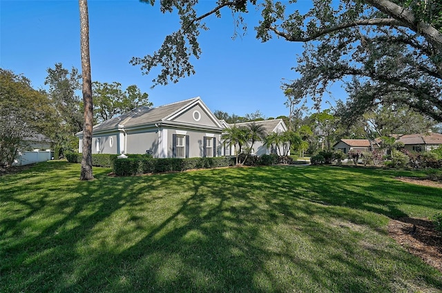 view of front of home with a front yard