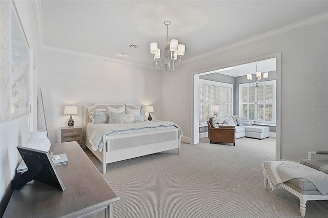 carpeted bedroom with crown molding and a chandelier