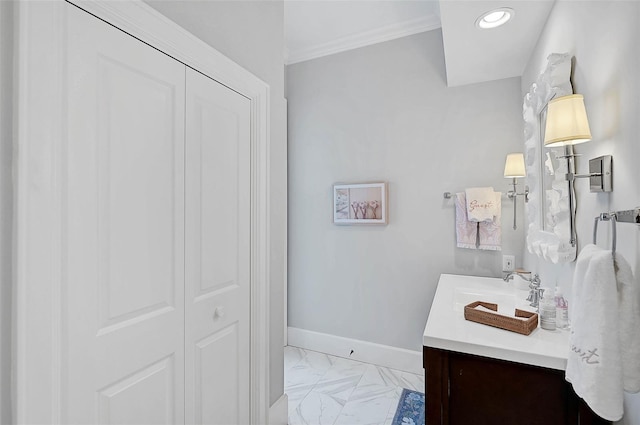 bathroom featuring vanity and crown molding