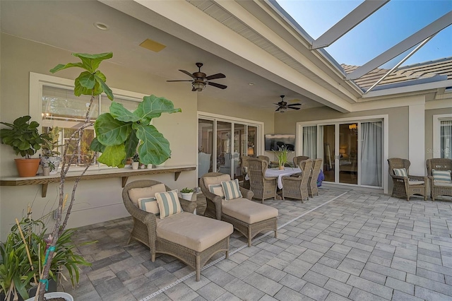 view of patio featuring ceiling fan